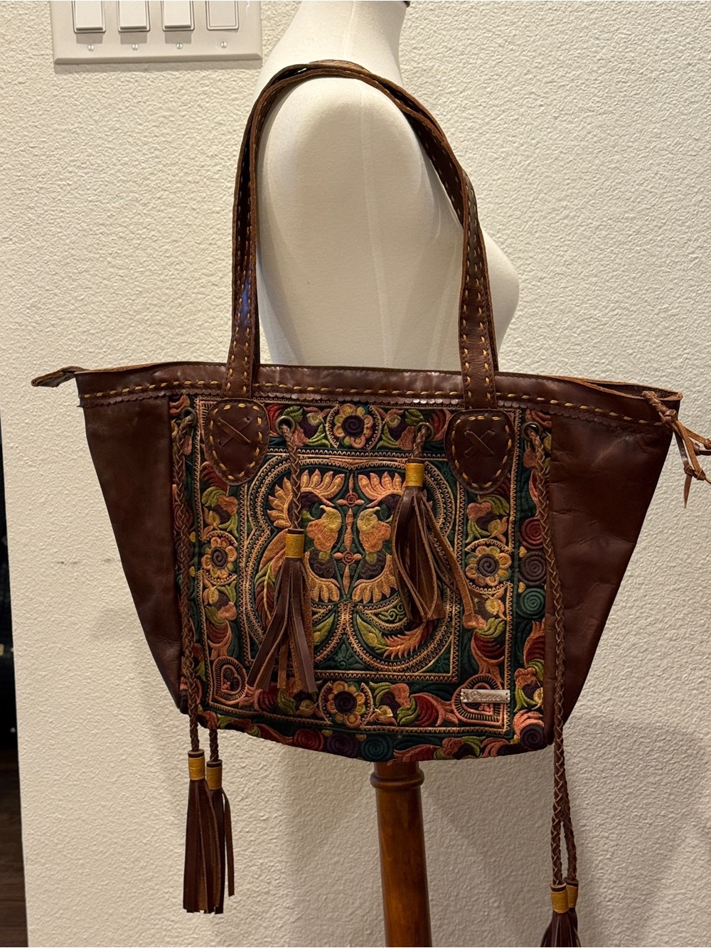 Pranee Embroidered Brown Leather Tote with Tassel Accents